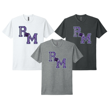 Three short-sleeve crewneck t-shirts shown on a white background: one white, one dark heather gray, and one charcoal, each featuring a large purple 'RM' monogram in collegiate type.  The River Mill Jaguar connects the two letters and Jaguars text lays on the left line of the R.  Making a classic letterman style design.
