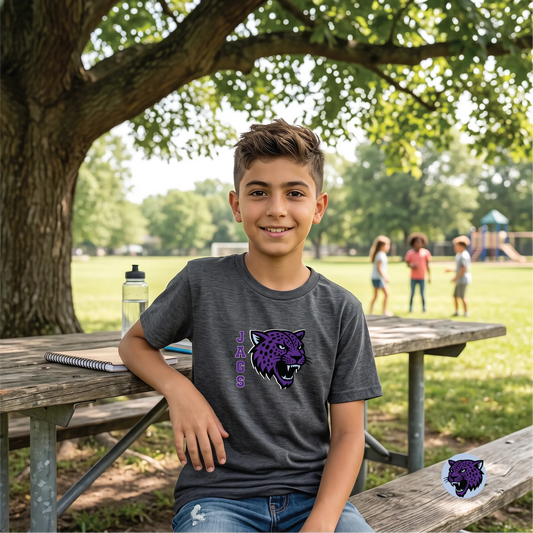 A model wearing the River Mill Academy Jaguar Mascot Tee.