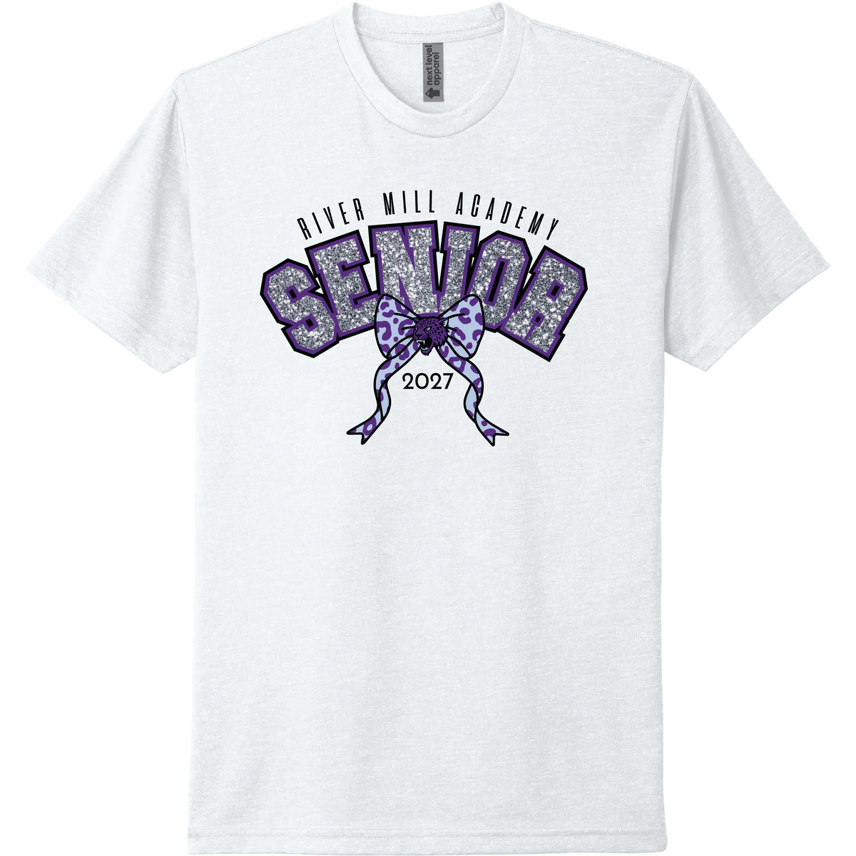 A white short-sleeve t-shirt with a purple and silver glittery graphic on the chest reading 'River Mill Academy Senior 2027' with a bow design.